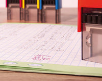 Lehrerstempel auf einem Schulheft – Beurteilung und Motivation
